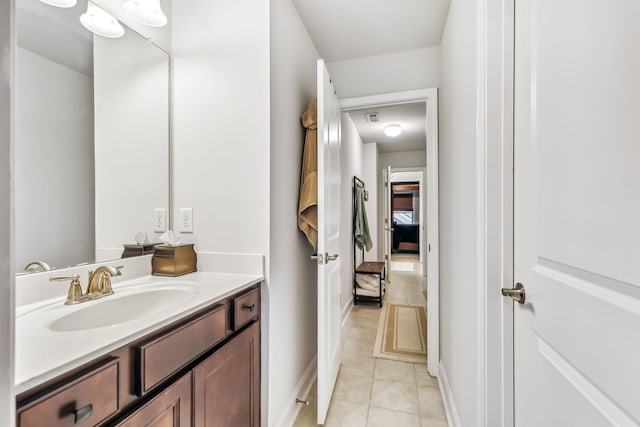 bathroom featuring vanity and tile patterned floors