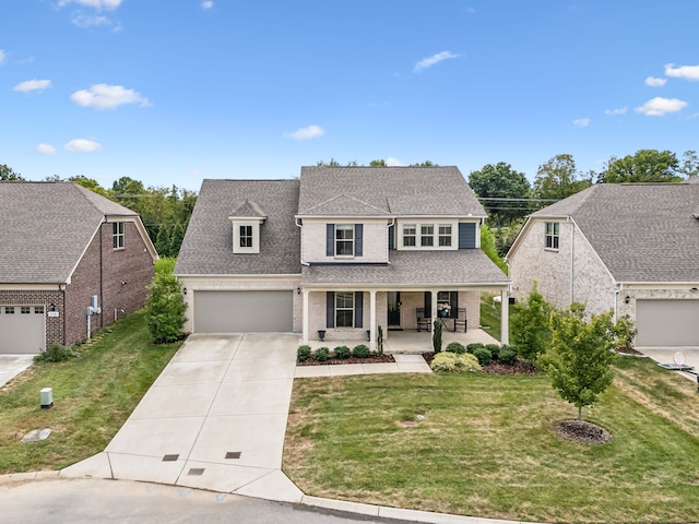 view of front of house with a front yard and a porch