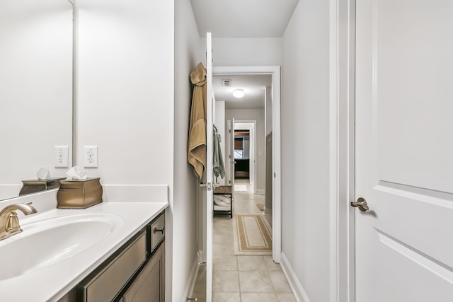 bathroom featuring vanity and tile patterned flooring