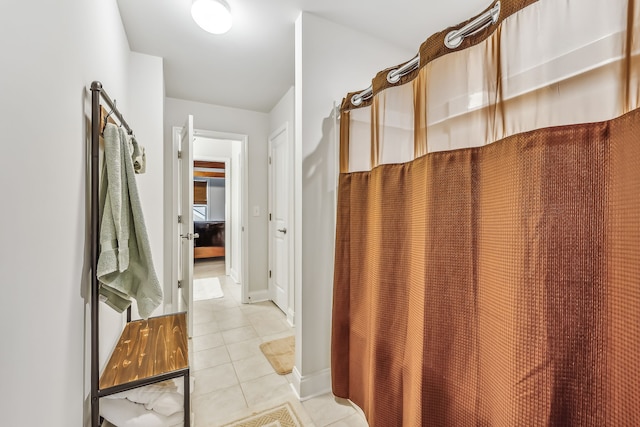 bathroom featuring tile patterned flooring