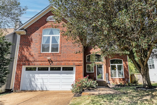 view of property featuring a garage