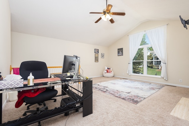 carpeted office featuring lofted ceiling and ceiling fan