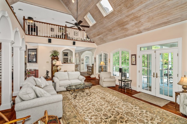 living room featuring french doors, high vaulted ceiling, a healthy amount of sunlight, and ceiling fan