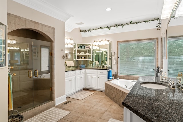 bathroom with tile patterned flooring, vanity, plus walk in shower, and crown molding