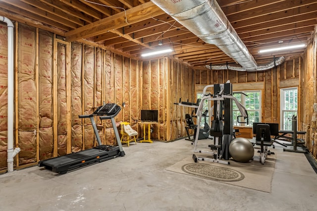 workout area featuring concrete floors