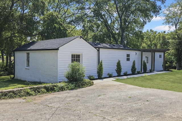 garage with a yard