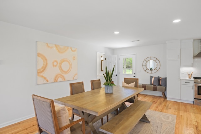 dining room featuring light hardwood / wood-style floors