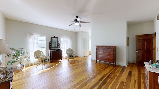 bedroom with wood-type flooring and ceiling fan