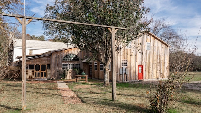 exterior space with a front lawn