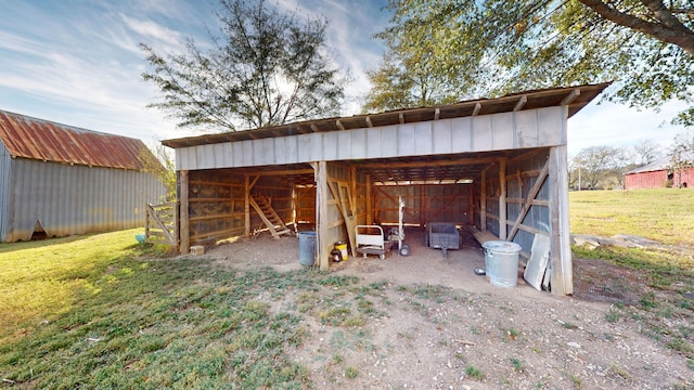 view of outdoor structure with a lawn