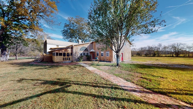 exterior space with a front yard