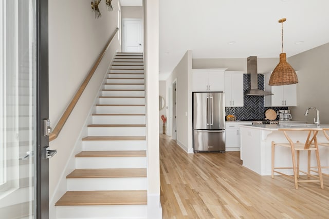 interior space featuring wood-type flooring and sink