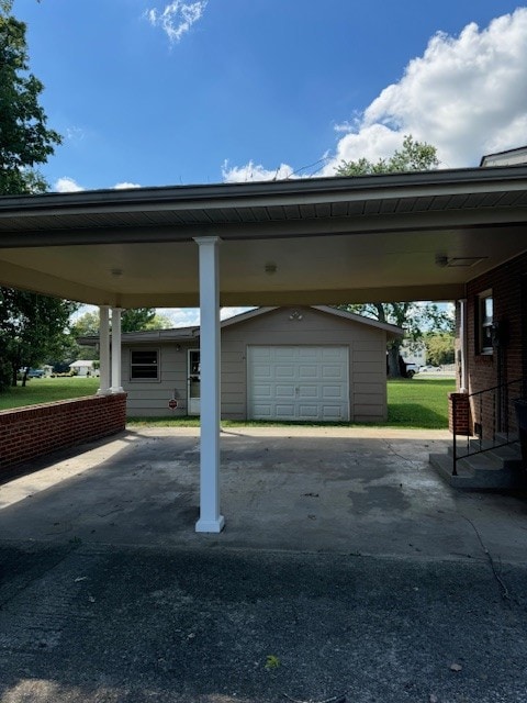 view of vehicle parking with a carport and a garage