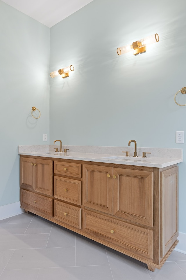 bathroom with tile patterned floors and vanity