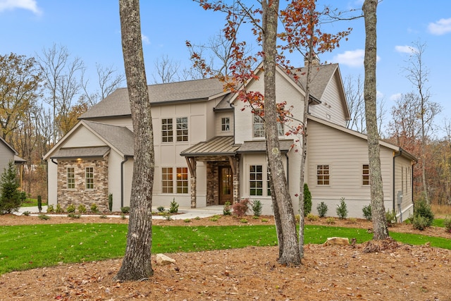 view of front facade with a front lawn