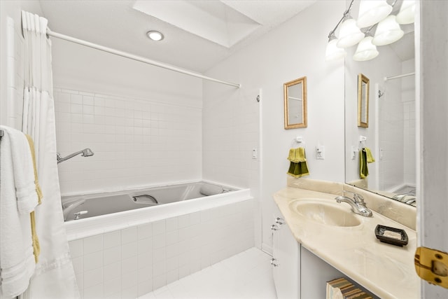 bathroom featuring vanity, tile patterned floors, and shower / bath combo