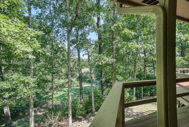 wooden balcony featuring a deck