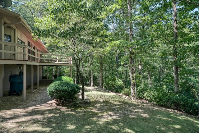 view of yard with a wooden deck