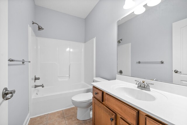 full bathroom featuring vanity, toilet, tile patterned flooring, and shower / bath combination