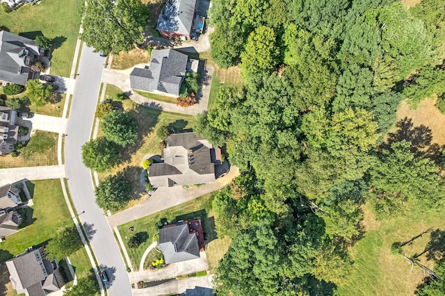 birds eye view of property with a residential view