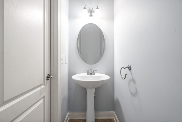 bathroom featuring baseboards