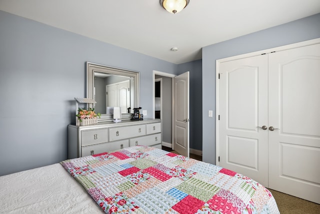 carpeted bedroom with a closet