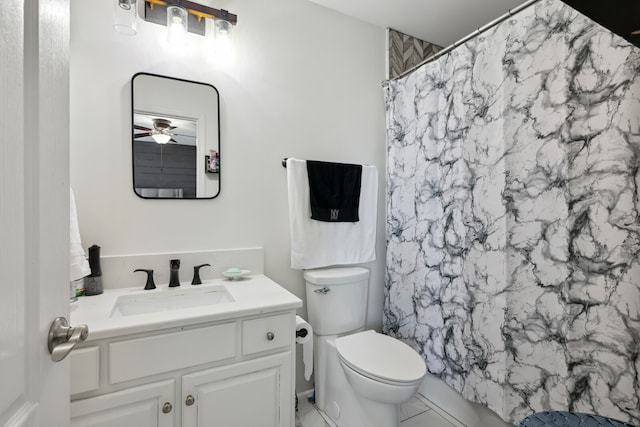 bathroom with toilet, tile patterned floors, vanity, ceiling fan, and a shower with curtain