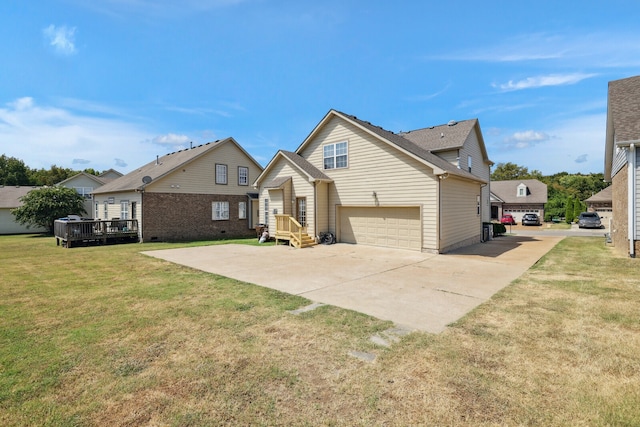 view of front of home with a garage, a deck, and a front lawn