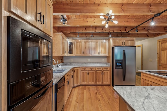 kitchen with light stone counters, a sink, wood ceiling, light wood-style floors, and black appliances