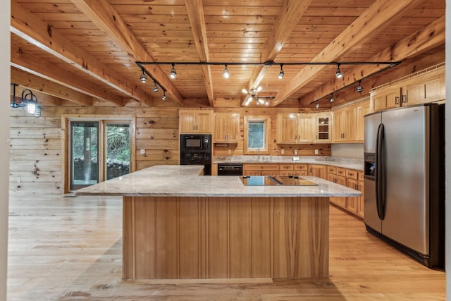 kitchen featuring light wood-type flooring, wooden ceiling, a healthy amount of sunlight, and black appliances