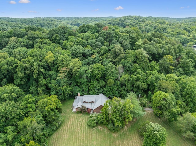 aerial view featuring a view of trees