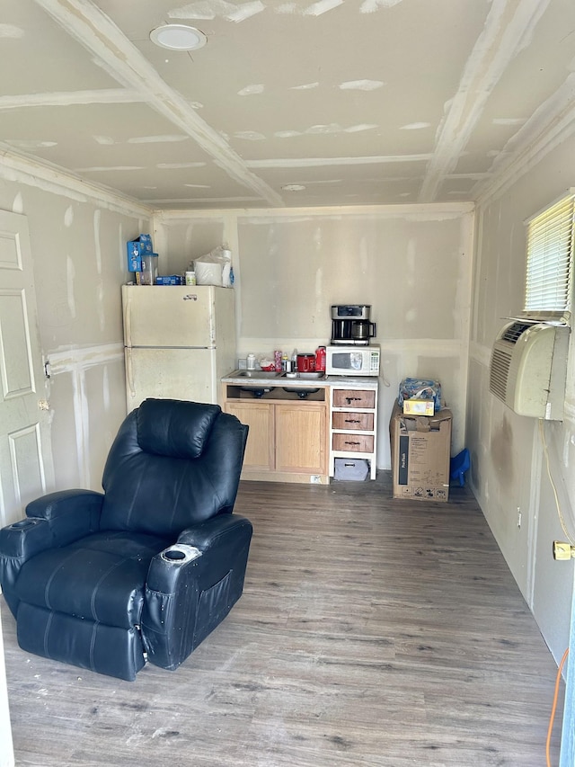 living area with wood finished floors