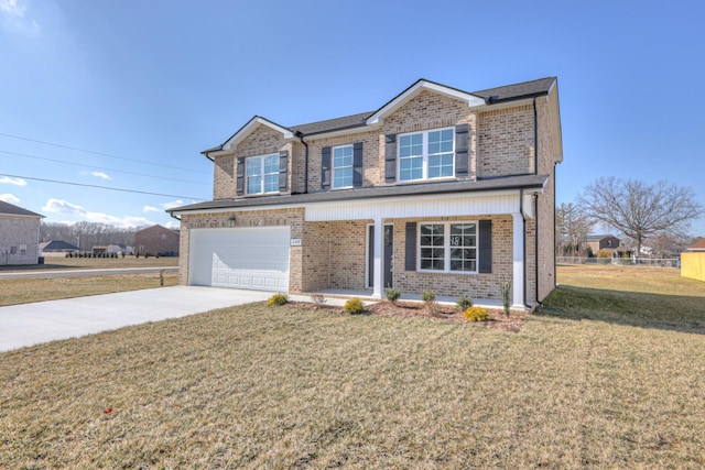 view of front facade with a garage and a front lawn