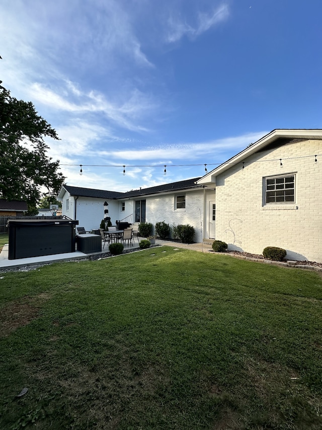 exterior space with a yard and a patio