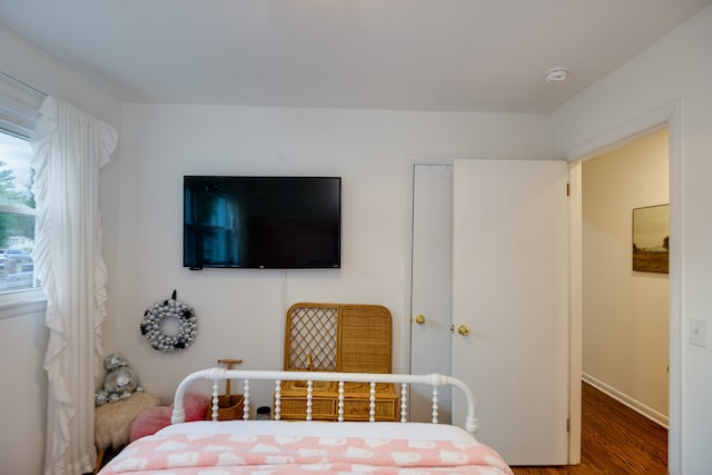 bedroom featuring hardwood / wood-style floors