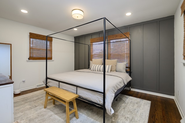 bedroom with wood-type flooring