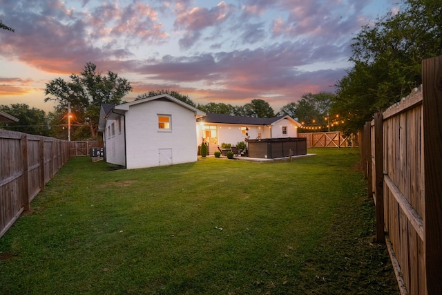 yard at dusk with a swimming pool