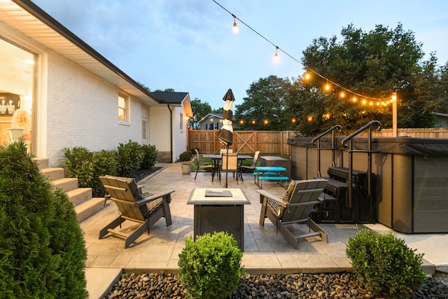 view of patio featuring a fire pit