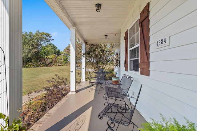 4584 S Mill Ln, Cross Plains, TN 37049 - covered porch with a lawn