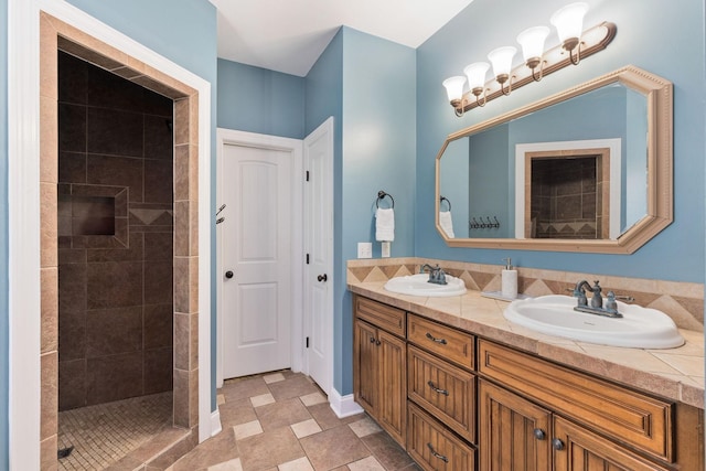 4584 S Mill Ln, Cross Plains, TN 37049 - bathroom featuring double vanity and tiled shower
