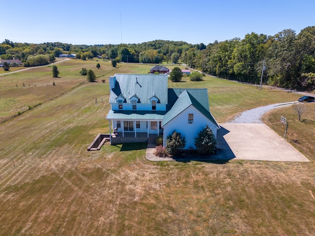 birds eye view of property featuring a rural view