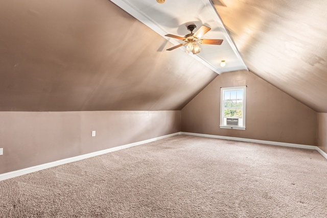 additional living space featuring lofted ceiling, ceiling fan, and carpet floors