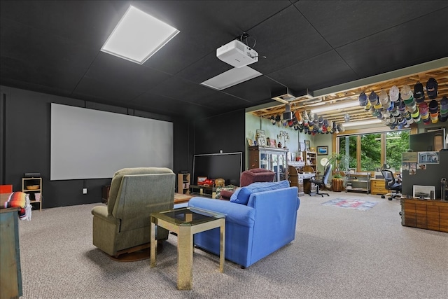 home theater room featuring carpet flooring