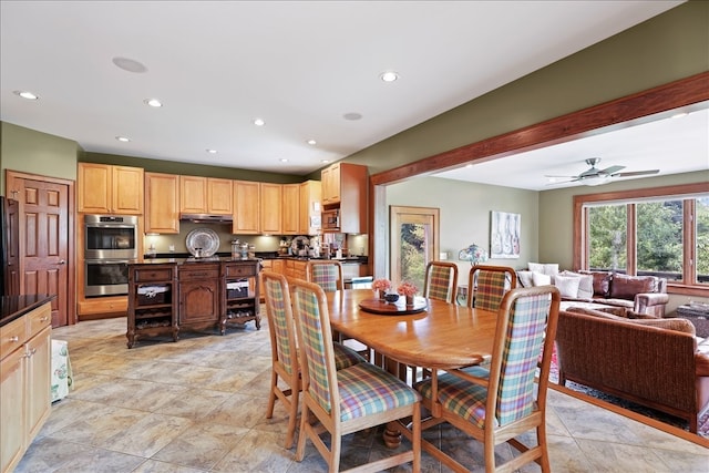 dining room featuring ceiling fan