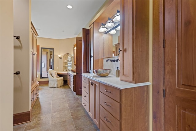 bathroom featuring vanity and tile patterned flooring