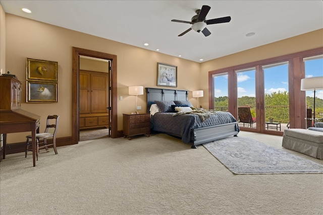 carpeted bedroom with ceiling fan and access to outside