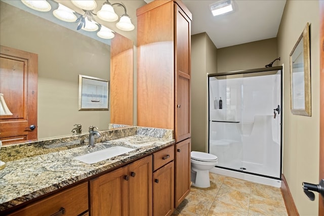 bathroom with vanity, toilet, walk in shower, and a notable chandelier