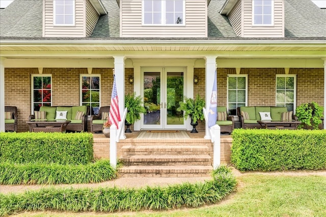 property entrance with covered porch