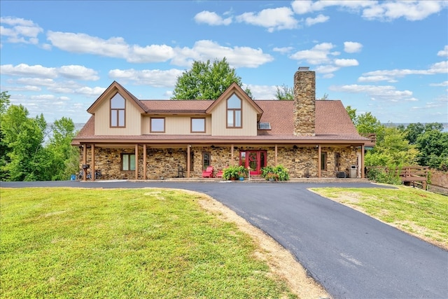 view of front of home featuring a porch and a front lawn