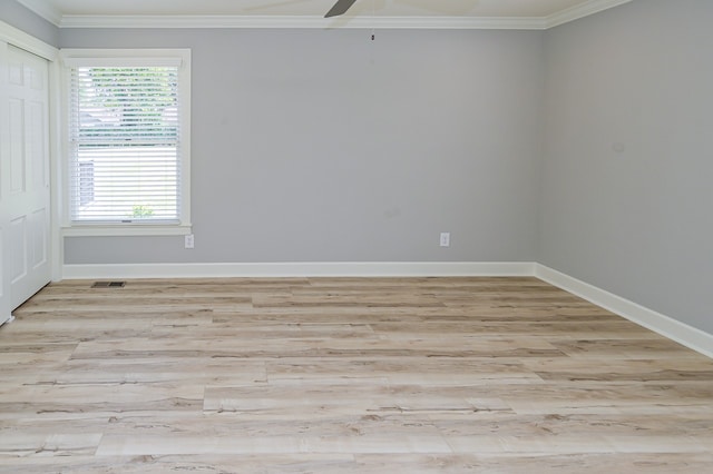 unfurnished room featuring ceiling fan, ornamental molding, and light hardwood / wood-style floors